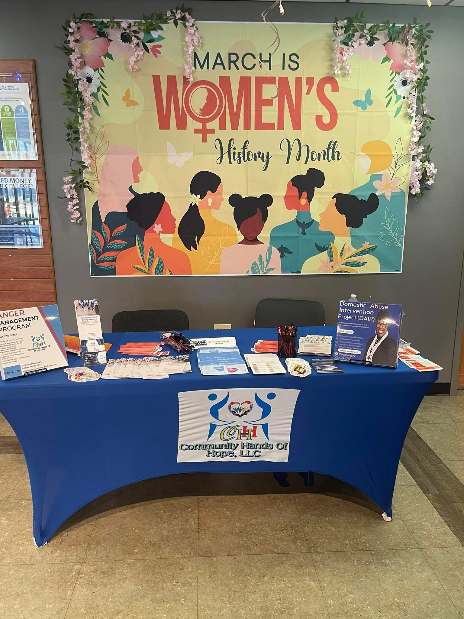 Community Hands of Hope booth at Women's History Month event